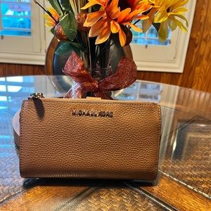 Dark brown wallet with two zipper pouches